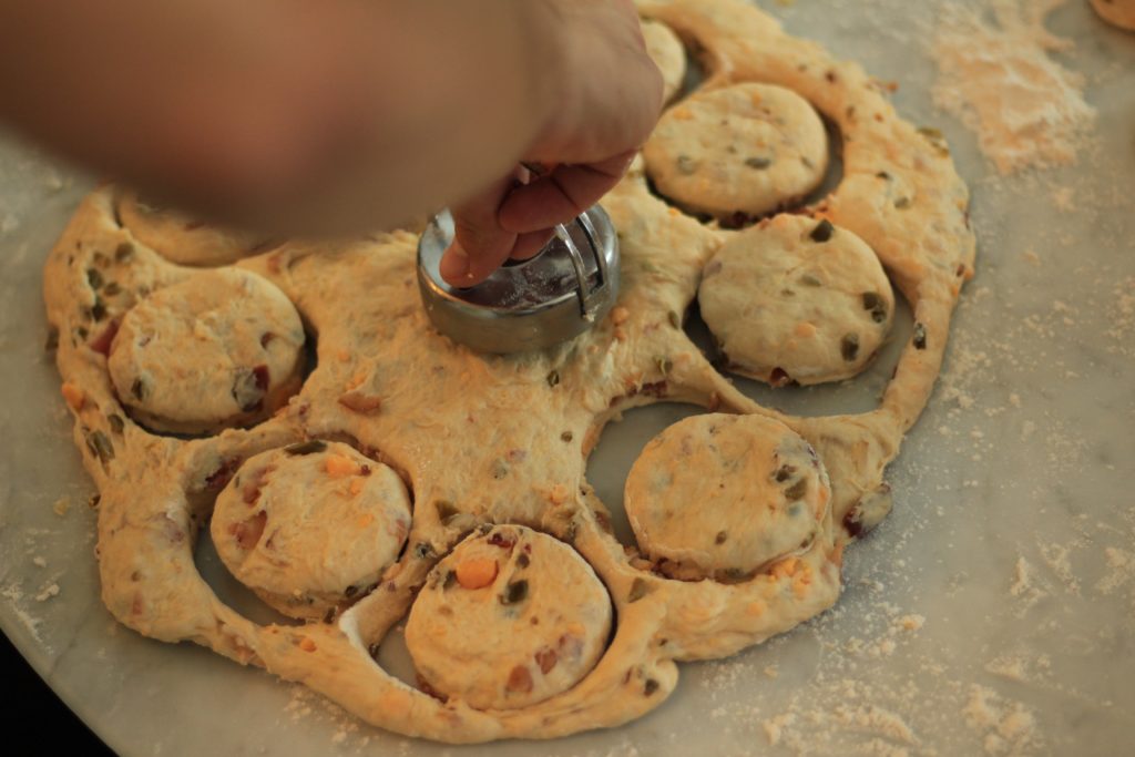 savory-pizza-doughnut-preparation